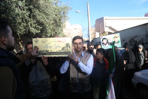 تشییع شهید گمنام بر روی دستان دانشجو معلمان پردیس امام خمینی (ره) گرگان. 6